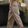 574546a4d93e1223c4e1e80a725322c1-1 Loose Casual Hollow Out Lace Pockets Drawstring Waist Plain Linen Pants